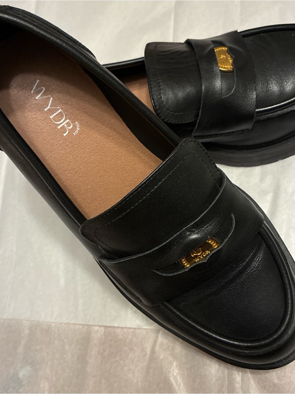 WYLDR Black Leather Slip-On Penny Loafers with Gold Accent